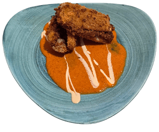 Penca rellena con salsa de piquillos del Restaurante Graccurris de Alfaro